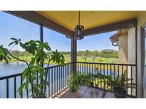 Relaxing screened-in balcony with gorgeous views of the lake and golf course at 2400 Feather Sound Dr # 735, Clearwater, FL 33762