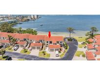 Waterfront condo community with red tile roofs and stunning water views in a coastal setting at 2700 Bayshore Blvd # 511, Dunedin, FL 34698