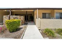 Inviting front entrance with a walkway and landscaped surroundings leading to the main door of the property at 1515 12Th Se Ct # 55, Largo, FL 33771