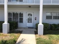 Charming condo featuring a welcoming entrance and nicely landscaped surroundings at 2450 Canadian Way # 6, Clearwater, FL 33763
