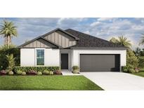 Charming single-story home featuring a two-car garage, landscaped front yard, and neutral color palette at 4086 Polynesia Rd, North Port, FL 34288