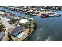 Waterfront property with a pool and boat dock, nestled in a beautiful canal community at 926 Eagle Ln, Apollo Beach, FL 33572