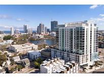 Stunning aerial view of a modern building, showcasing urban skyline and waterfront at 777 3Rd Ave N # 1403, St Petersburg, FL 33701