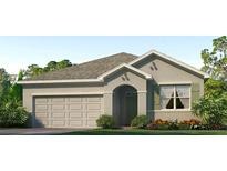 Charming one-story home featuring a neutral color palette, attached garage, and well-maintained landscaping at 32661 Osprey Peak Way, San Antonio, FL 33576