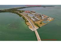 Stunning aerial view of the condo complex near Honeymoon Island and the Dunedin Causeway at 7 Island Park Pl # 204, Dunedin, FL 34698