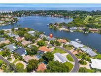Beautiful aerial view of the waterfront property with a marked location pin on the home at 1124 35Th Ne Ave, St Petersburg, FL 33704