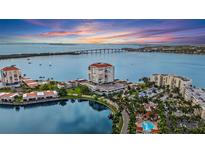 Stunning aerial view of Bahia Point condos on Siesta Key, Florida, with waterfront views and a picturesque sunset at 6287 Bahia Del Mar Cir # 404, St Petersburg, FL 33715