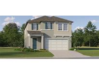 Charming two-story home featuring a two-car garage, well-manicured lawn, and inviting front entry at 11744 E 71St Ter, Palmetto, FL 34221