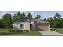 Traditional single-Gathering home with a two-car garage, neutral paint, and manicured landscaping at 12617 Aura Moonlight Ter, Parrish, FL 34219