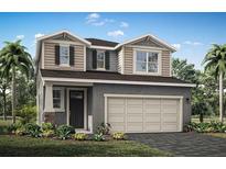 Charming two-story home with a two-car garage and well-manicured lawn at 31356 Pendleton Landing Cir, Wesley Chapel, FL 33545