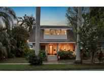 Charming two-story home boasting a welcoming front porch and beautiful landscaping at 146 8Th Ne Ave, St Petersburg, FL 33701