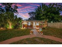 Charming single-story home featuring a covered front porch and well-maintained landscaping at 1111 32Nd N St, St Petersburg, FL 33713