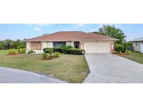 Charming single-story home with well-maintained landscaping and attached two car garage at 280 Fortaleza St, Punta Gorda, FL 33983