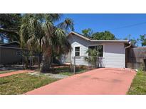 Charming single-story home featuring a small yard and mature trees, perfect for relaxed living at 342 N 40Th N St, St Petersburg, FL 33713