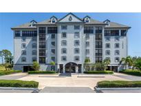 Beautiful five-story condo building with elegant architecture and a well-maintained entrance in a desirable community at 14820 Rue De Bayonne # 208, Clearwater, FL 33762