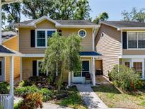 Charming two-story home with a well-maintained front yard and inviting entrance at 3078 Pointer Dr, Palm Harbor, FL 34683
