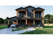 Striking two-story home with a covered car port, wooden pillars, complemented by beautifully landscaped front yard at 110 W Hiawatha St, Tampa, FL 33604