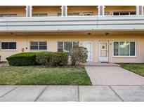 A charming condo building featuring well-maintained landscaping, sidewalks, and ample windows at 2286 Norwegian Dr # 8, Clearwater, FL 33763