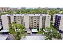 Spacious condo building offering covered parking and beautiful landscaping at 2700 Cove Cay Dr # 2B, Clearwater, FL 33760