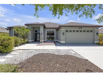 Charming single-story home with neutral paint, manicured landscaping, and a well-maintained front yard at 4535 29Th Avenue E Cir, Palmetto, FL 34221