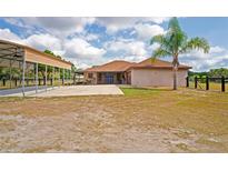 Lovely ranch style home with covered parking and a well maintained yard at 39427 Comstock Ln, Zephyrhills, FL 33540
