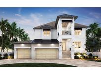 Beautiful new construction home with a light exterior, two car garage, second story balcony, and manicured landscaping at 4 W Spanish Main St, Tampa, FL 33609