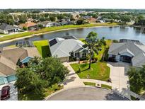 A beautiful single Gathering home with lake view and mature landscaping in a Florida neighborhood at 2908 122Nd Pl E, Parrish, FL 34219