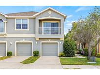 Charming townhome featuring a private balcony and one-car garage at 8848 Moonlit Meadows Loop, Riverview, FL 33578