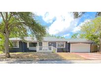 Charming single-story home with a well-maintained front yard and a quaint, covered front porch at 2400 13Th S Ave, St Petersburg, FL 33712