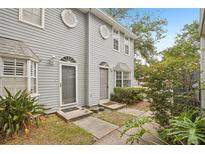 Charming two-story townhome with neutral siding, well-maintained landscaping, and inviting entryway at 8101 Interbay Blvd # A, Tampa, FL 33616