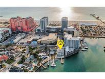 Beautiful waterfront property with boat dock and city views near a sandy beach at 94 Devon Dr, Clearwater Beach, FL 33767