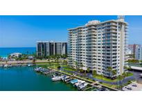 Harbourside condo with boat slips, waterfront views, and palm trees in a tropical location at 1621 Gulf Blvd # 1604, Clearwater Beach, FL 33767