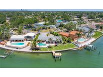 Waterfront home with a pool and dock provides direct access to the bay at 2788 70Th S Ave, St Petersburg, FL 33712