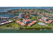 Beautiful aerial view showcasing the waterfront property, landscaping, and community amenities at 6295 Bahia Del Mar Cir # 406, St Petersburg, FL 33715