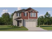 Charming two-story home features a two-car garage and nicely landscaped front yard at 11745 E 71St Ter, Palmetto, FL 34221