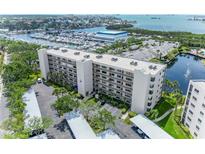 Spacious condo building with harbor views and lush landscaping, convenient parking, near recreational facilities at 1316 Pasadena S Ave # 303, South Pasadena, FL 33707