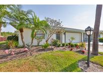 Charming single story home with a well-manicured lawn and garden at 2115 N Halcyon Dr # 510, Sun City Center, FL 33573