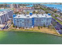 Waterfront condo complex featuring stunning water views and direct access to the bay in a coastal setting at 500 Treasure Island Cswy # 607, Treasure Island, FL 33706