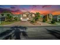 Beautiful home exterior with well-manicured landscaping and a long driveway at 6121 Fjord Way, New Port Richey, FL 34652