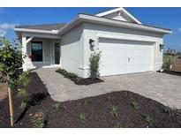 Charming single-story home featuring a two-car garage and manicured front yard landscaping at 4531 Gardner St, Bradenton, FL 34210
