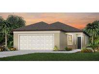 Charming one-story home with a two-car garage, manicured landscaping, and a walkway to the front door at 10516 Hidden Banks Gln, Parrish, FL 34219