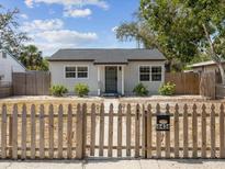Charming single-story home featuring a well-maintained front yard and classic picket fence at 6436 2Nd S Ave, St Petersburg, FL 33707