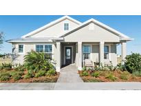 Charming single-story home with a beautifully landscaped front yard and welcoming porch at 7625 Highgrove Ave, Bradenton, FL 34210