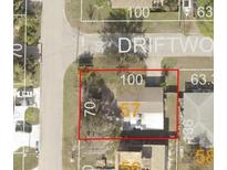 Overhead view of property on Driftwood Ln showing its location, neighboring properties, and proximity to the street at 212 Driftwood Pl, Palm Harbor, FL 34683