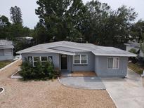 Charming single-story home with a well-maintained front yard and neutral gray paint at 6710 Hibiscus S Ave, South Pasadena, FL 33707