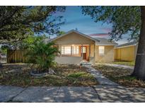 Charming single-story home with a cozy front porch and well-maintained landscaping at 5015 15Th S Ave, Gulfport, FL 33707