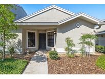 Charming home featuring a well-manicured front yard and a cozy, welcoming entrance at 5100 Burchette Rd # 3005, Tampa, FL 33647