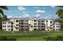 Attractive multi-story condo building with private balconies, neutral colors, and well-maintained landscaping at 17655 Opal Sand Dr # 304, Venice, FL 34293