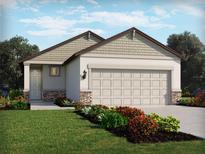 Charming single-Gathering home showcasing manicured landscaping and a neutral color palette, enhancing its curb appeal at 1877 Brekey Way, Zephyrhills, FL 33541