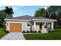 Charming single story home with a one-car garage, well-manicured lawn and tropical landscaping at 1107 Howard St, Clearwater, FL 33756